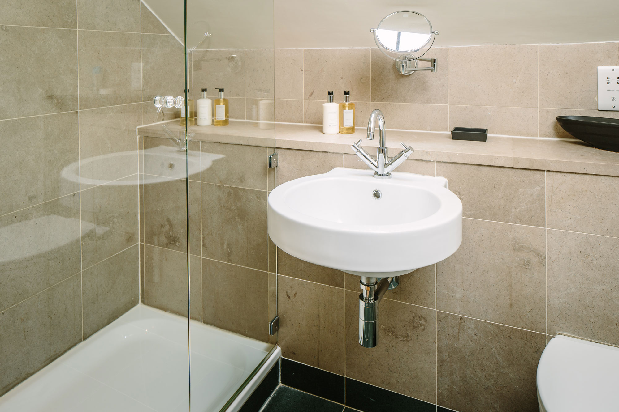 The ensuite bathroom to the second bedroom has a delightful shower