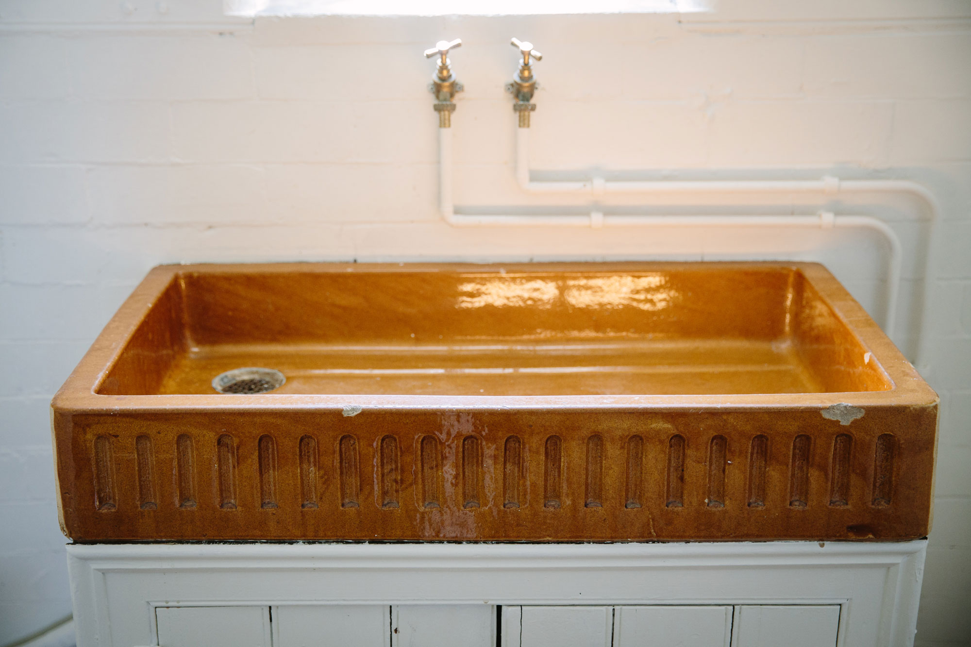 The original sink in the vestibule, how many hands were washed here before lunch?